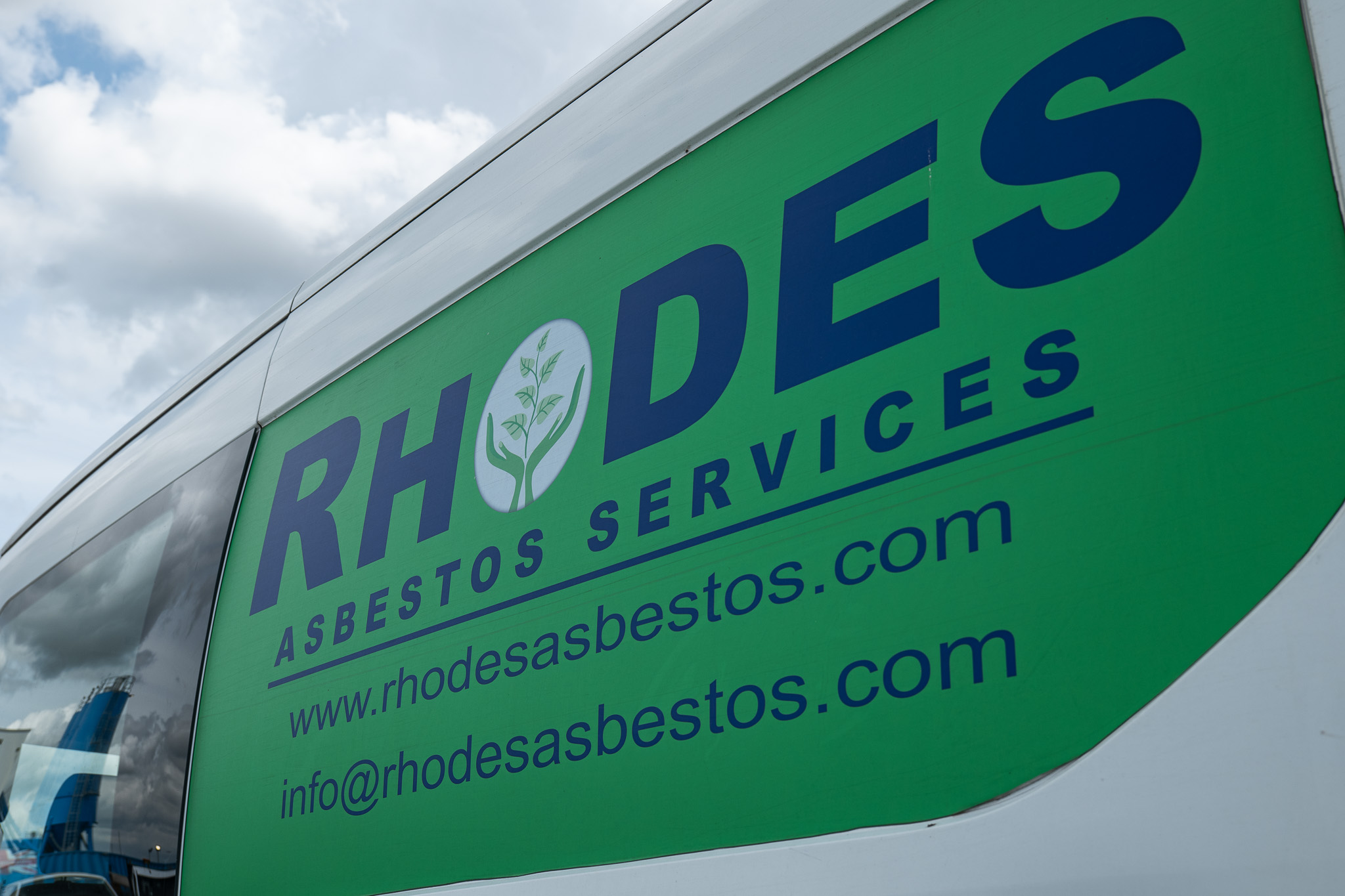 Rhodes Asbestos Services vehicle supporting professional clearance work