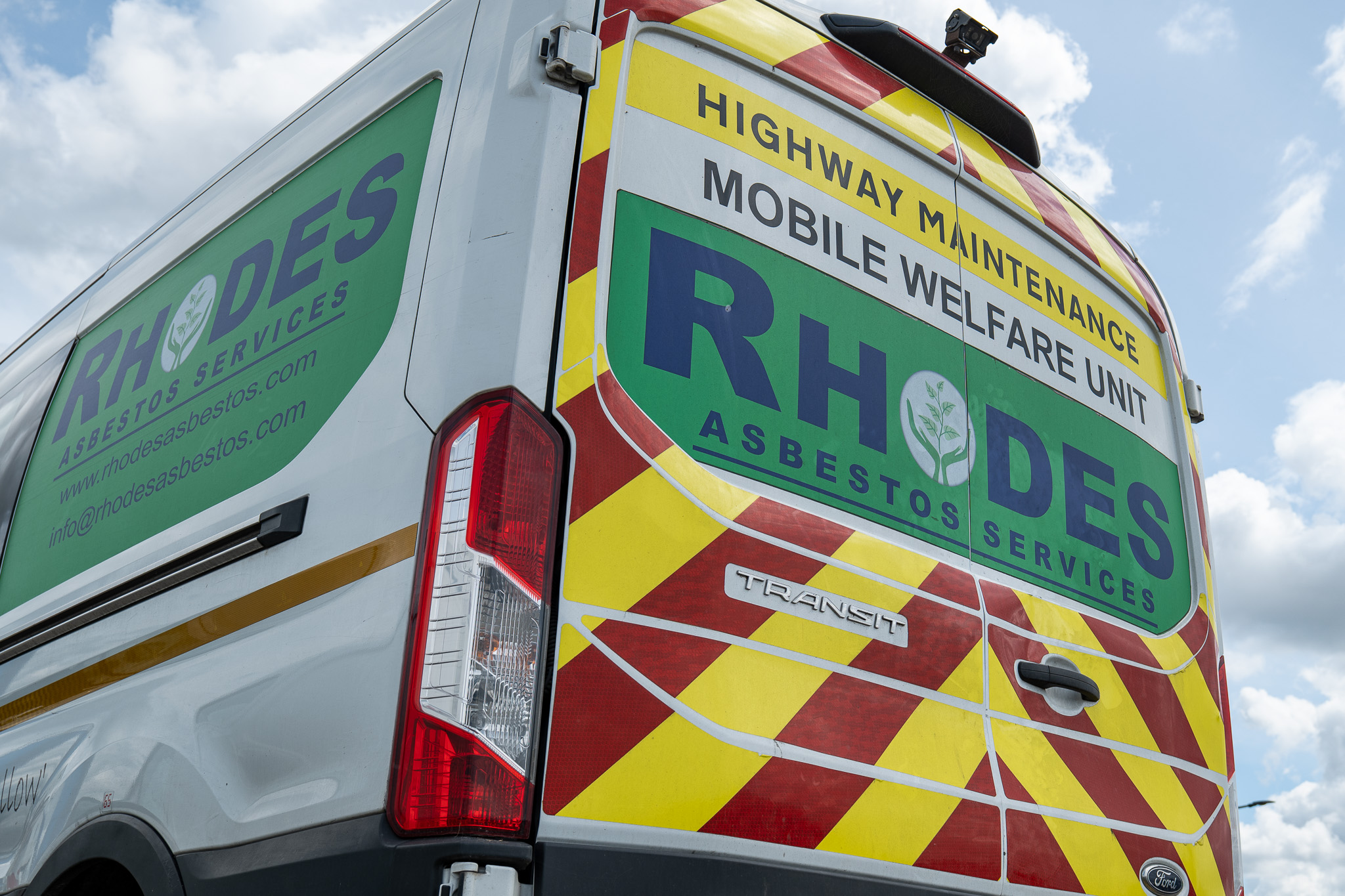 Rhodes Asbestos Services vehicle ready for asbestos removal work